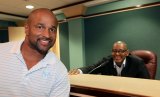 Former LHS athlete and NFL Hall of Fame nominee Lorenzo Neal, who looks like he could still play football, during a recent visit to Lemoore City Hall. In the background is his brother, Mayor Eddie Neal.